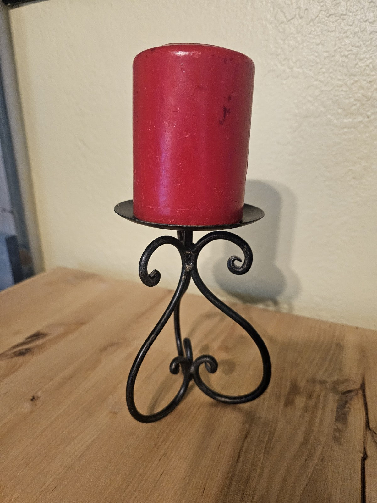 Candle holder with candle pillar red candle