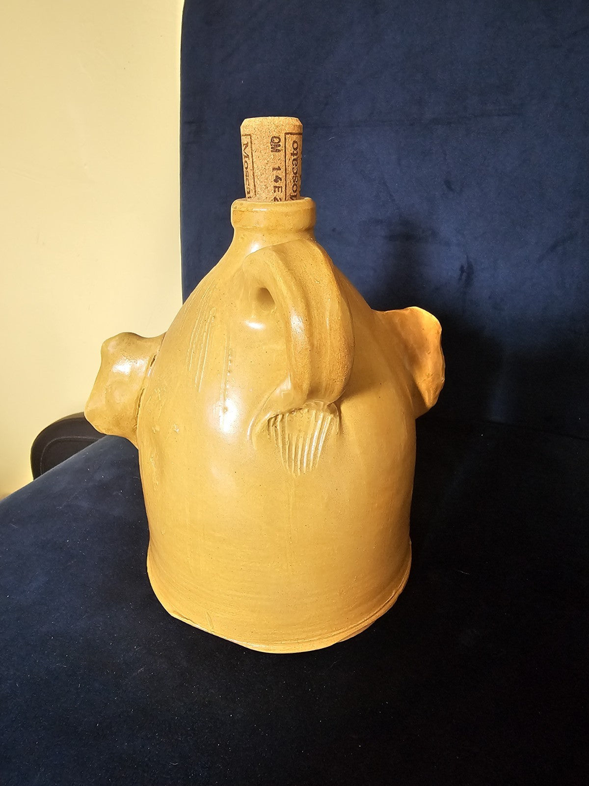Vintage Art Moonshine jug or handmade clay sculpture a head with a cork